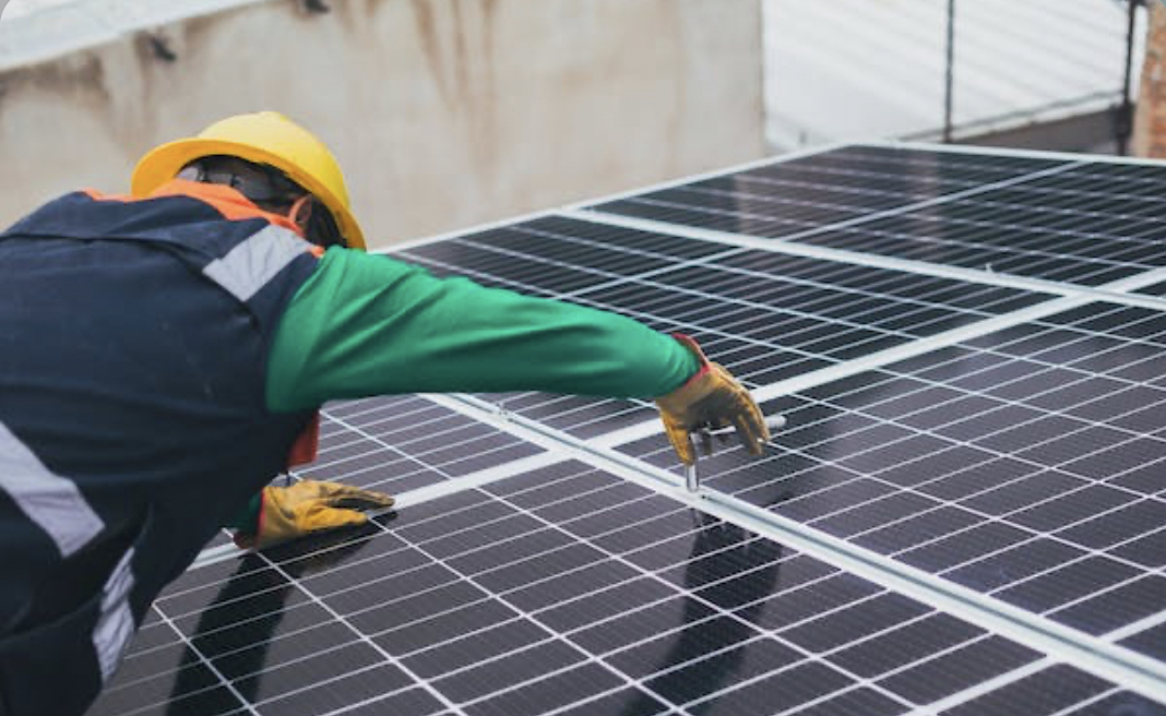 Man is checking Solar Panels