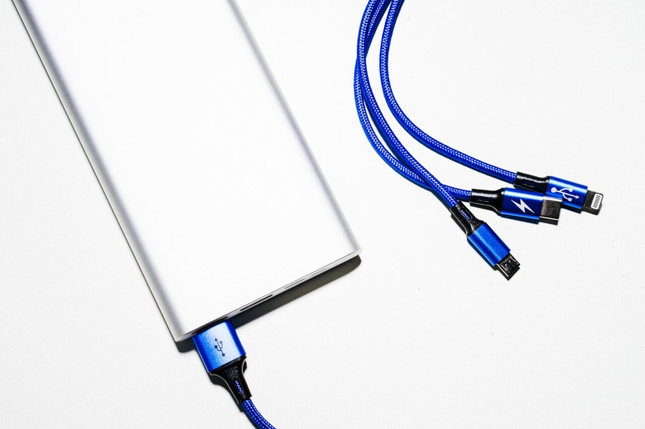 white power bank with blue wires